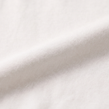Close-up van de zachte bamboestof van het witte nijntje kinder-T-shirt met groene nijntje opdruk